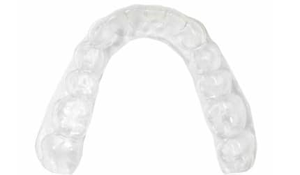 A transparent removable dental aligner.